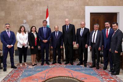 Lebanon's President Michel Aoun, centre, and Prime Minister Najib Mikati, centre right, with an IMF delegation headed by Ernesto Ramirez-Rigo, centre left, at the presidential palace in Baabda, east of the capital Beirut. AFP