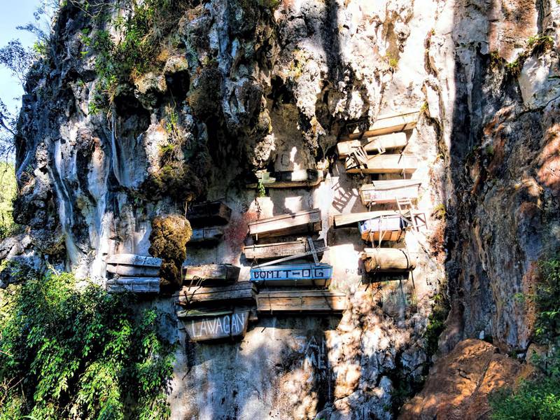 The hanging coffins of Sagada in the Philippines are one part intriguing, one part eerie. Courtesy flickr / Dan Lunberg