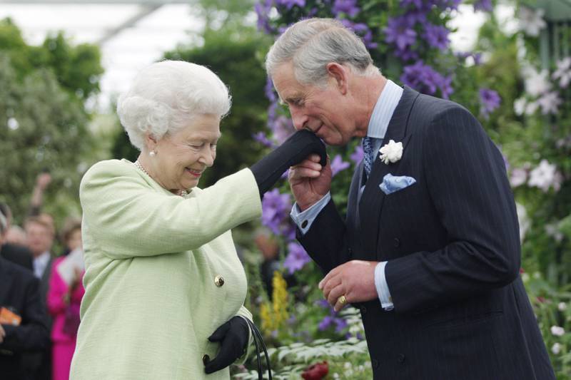 Queen Elizabeth presents her son Prince Charles with the Royal Horticultural Society's Victoria Medal of Honour at the 2009 show. Getty Images