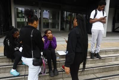 Students react to their A-level results at City of London College. Getty Images