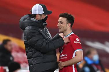 Liverpool manager Jurgen Klopp with Portuguese striker Diogo Jota during the win over Leicester. AFP