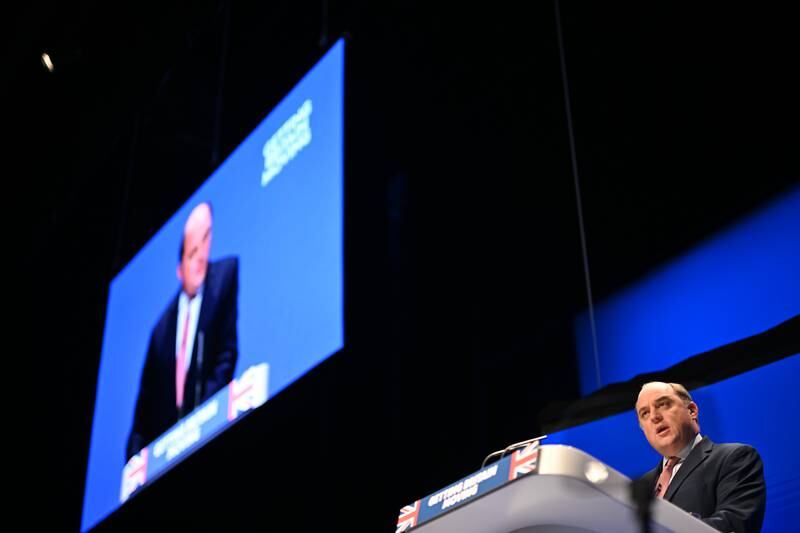 Mr Wallace speaks at the annual Conservative Party conference in October. Getty Images