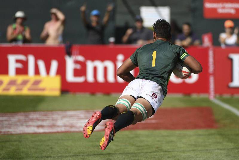 South Africa’s Chris Dry scores a try against New Zealand in the quarter-final. Martin Dokoupil / AP Photo