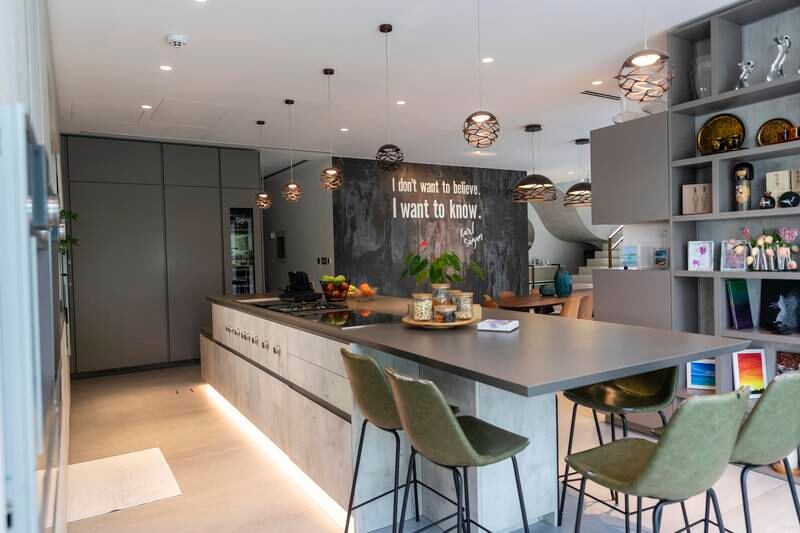 The couple spent Dh1.3 million extending the kitchen, which features a teppanyaki grill. Antonie Robertson / The National