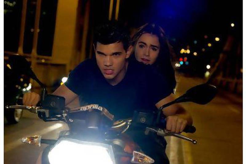 'Twilight' star Taylor Lautner will celebrate his 30th birthday in 2022. He is seen here with Lily Collins star in the action-thriller 'Abduction'. Photo: DataBean
