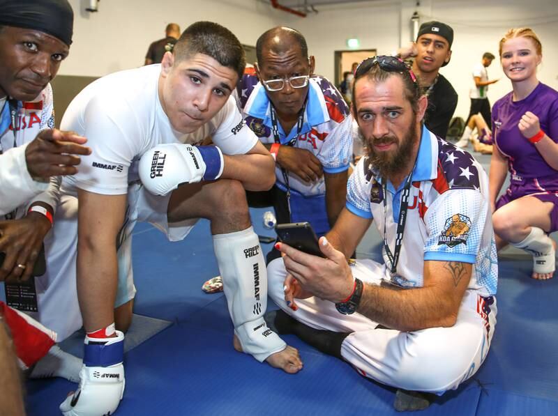 Chase Gamble, coach of Team USA, with star fighter Eric Cortez. All pictures Victor Besa / The National