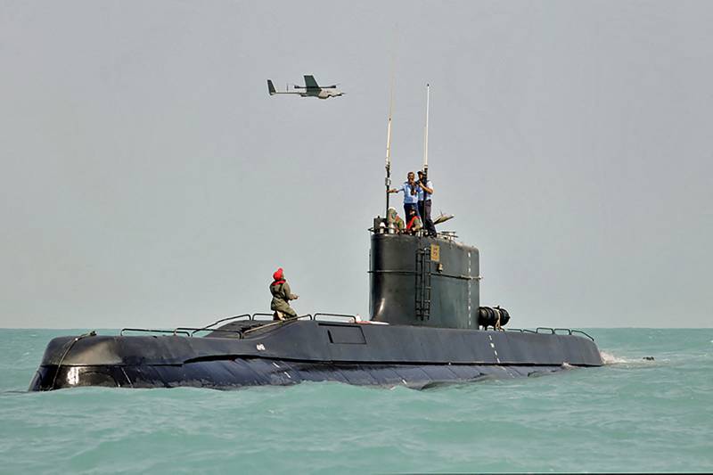 Troops on a submarine take part in the exercise. AFP