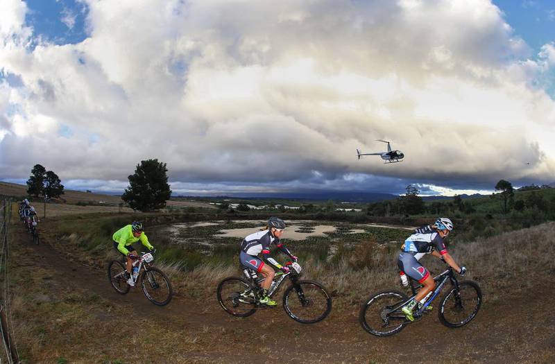 Cyclists compete during Stage 2 of the Absa Cape Epic mountain bike race on Tuesday in South Africa. Nic Bothma / EPA