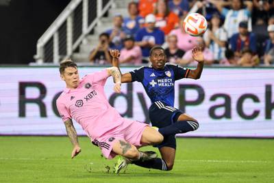 Robert Taylor of Inter Miami and Ray Gaddis of FC Cincinnati challenge for the ball. Getty