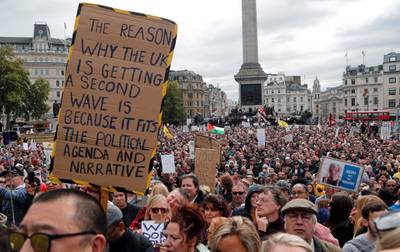 People take part in a 'We Do Not Consent' rally at Trafalgar Square to protest against coronavirus restrictions in September 2020. AP Photo