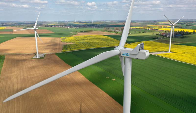 Engie Green power-generating windmill turbines in rapeseed and wheat fields in Saint-Hilaire-lez-Cambrai, France. Reuters