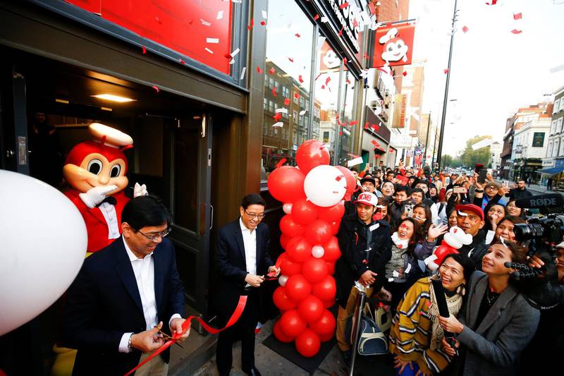 Jollibee CEO Ernesto Tanmantiong opens the first Jollibee restaurant in the UK, in London, Britain. Reuters