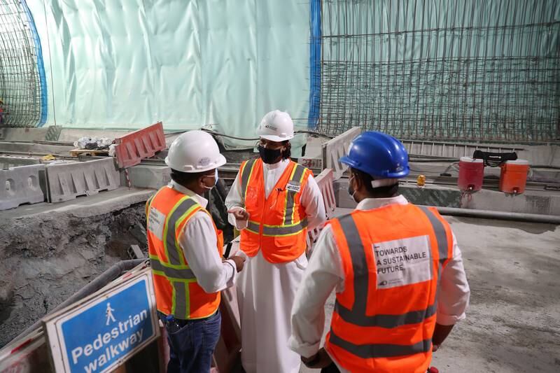 Officials working inside the Etihad Rail tunnel in Fujairah.