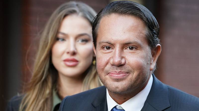 James Stunt, with his partner Helena Robinson, arriving at court in Leeds. PA