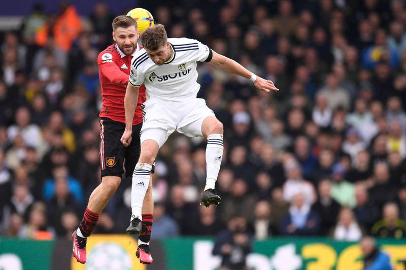 Manchester United's Luke Shaw vies with Leeds United's Patrick Bamford. AFP