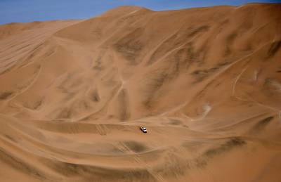 A Toyota car competes during the Dakar Rally Stage 5 between Tacna and Arequipa in Peru. AFP