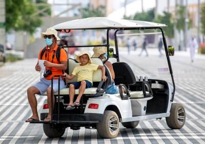 Tourists ride a buggy along Jubilee Avenue. Victor Besa / The National