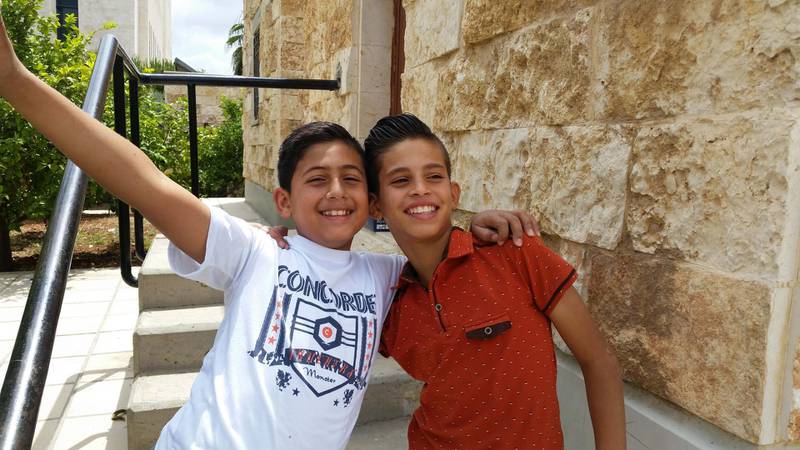 May 28/16-Orphans in Irbid, Jordan. At the Irbid branch of SOS Children's Village. They are a musical group of orphans who love to sing, and their dream is to go to the beach. (Rym Ghazal / The National) *** Local Caption ***  orphans ahmed and khalid.jpg