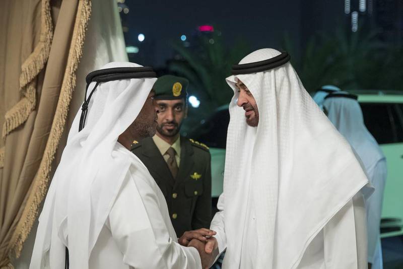 Sheikh Mohammed bin Zayed, Crown Prince of Abu Dhabi and Deputy Supreme Commander of the Armed Forces, offers condolences to Juma Anbar Juma Al Falasi (L), brother of Saeed Anbar Juma Al Falasi, who died from injuries sustained while serving the Armed Forces in Yemen. Ryan Carter / Crown Prince Court - Abu Dhabi