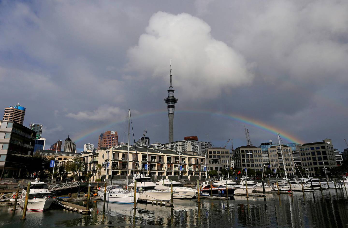 FILE PHOTO: A rainbow appears on the Auckland skyline featuring Sky Tower in New Zealand, July 8, 2017.  REUTERS/Jason Reed/File Photo