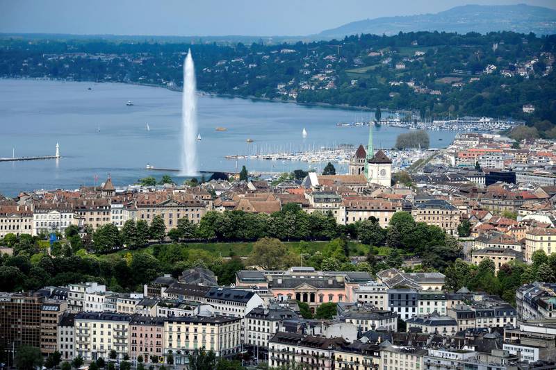 Aerial view taken on May 14, 2016, shows the Geneva lanscape with the Jet d'Eau fountain on Lake Geneva. (Photo by FABRICE COFFRINI / AFP)