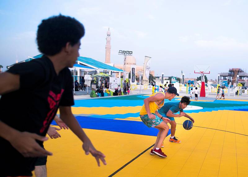 DUBAI, UNITED ARAB EMIRATES. 18 OCTOBER 2019. Basketball at Kite Beach Fitness Village.The city launches the third edition of the Dubai Fitness Challenge (DFC) today with wide range of activities across the city that will be accessible to the entire Dubai community.   Here, Kites Beach is converted into a dedicated fitness village with different zones for free outdoor activities.(Photo: Reem Mohammed/The National)Reporter:Section: