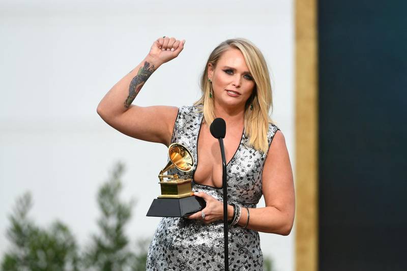 US country singer Miranda Lambert accepts the Best Country Album award for 'Wildcard' onstage during the 63rd Annual Grammy Awards at Los Angeles Convention Center. Getty Images