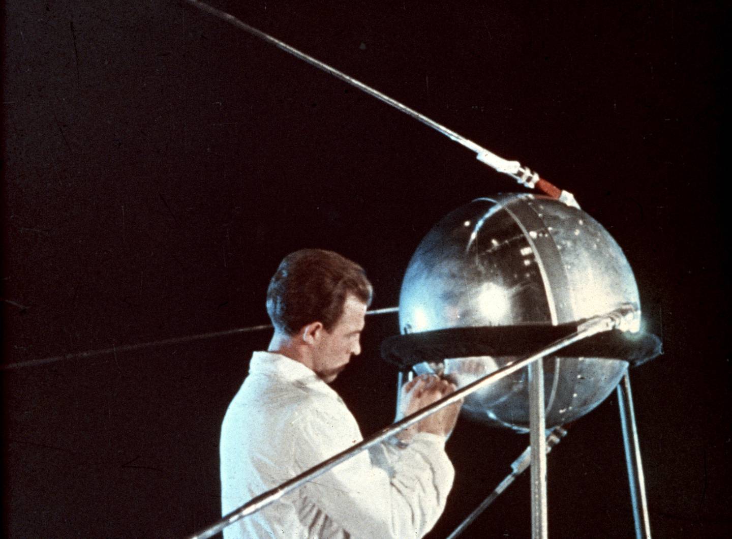 A Soviet technician working on Sputnik 1 in 1957. Getty
