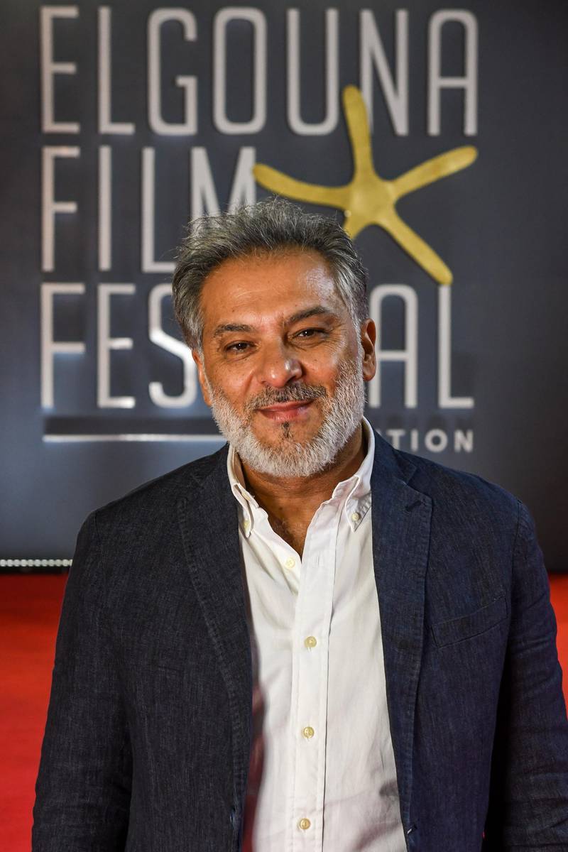 Syrian screenwriter Hatem Ali walks the red carpet as he attends the screening of 'Gunshots' during the second edition of the El Gouna film festival on the Red Sea in Egypt, on September 25, 2018. (Photo by Ammar Abd Rabbo / El Gouna Film Festival / AFP)