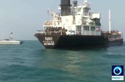 epa07725799 An undated picture made available by Iranian state television's English-language service, Press TV, on 18 July 2019, shows the Panamanian-flagged oil tanker MT Riah surrounded by Iranian Revolutionary Guard vessels in strait of Hormuz in Persian Gulf, Iran. Iran said on 18 July 2019, that its Revolutionary Guard seized a foreign oil tanker and its crew of 12 for smuggling fuel out of the country, the Riah, which had disappeared off trackers in Iranian territorial waters over the weekend.  EPA/PRESS TV / HANDOUT  HANDOUT EDITORIAL USE ONLY/NO SALES