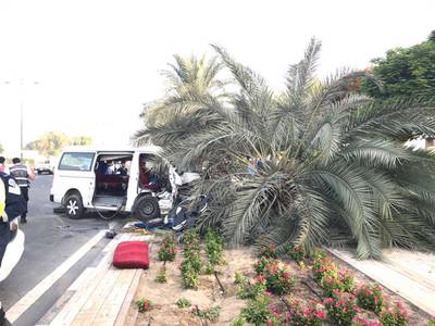 The mini bus driver lost control and swerved on Zabeel Street and hit a tree. Courtesy Dubai Police