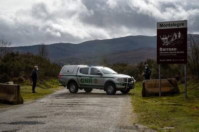 Portuguese National Republican Guards control a checkpoint in the Portuguese-Spanish border.  Portugal imposed controls on its border with Spain in an attempt to contain the spread of the coronavirus pandemic. AFP