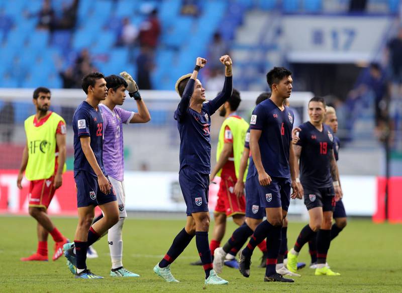 Dubai, United Arab Emirates - January 10, 2019: Thailand celebrate the win during the game between Bahrain and Thailand in the Asian Cup 2019. Thursday, January 10th, 2019 at Al Maktoum Stadium, Abu Dhabi. Chris Whiteoak/The National