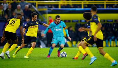 Lionel Messi was introduced as a second-half substitute after a month out with a calf injury in Barcelona's 0-0 Champions League draw away to Borussia Dortmund. Reuters