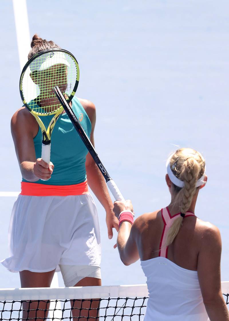 Jennifer Brady taps rackets with Angelique Kerber after their US Open fourth-round match. AFP