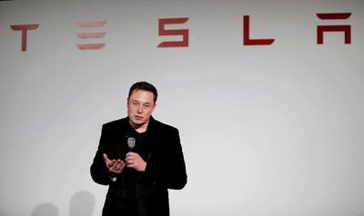 FILE - In this Sept. 29, 2015, file photo, Elon Musk, CEO of Tesla Motors Inc., talks about the Model X car at the company's headquarters, in Fremont, Calif. Electric auto brand Tesla Inc. says it has secured land in Shanghai for its first factory outside the United States, pushing ahead despite mounting U.S.-Chinese trade tensions. The company said it signed an agreement on a 210-acre (84-hectare) site. (AP Photo/Marcio Jose Sanchez, File)