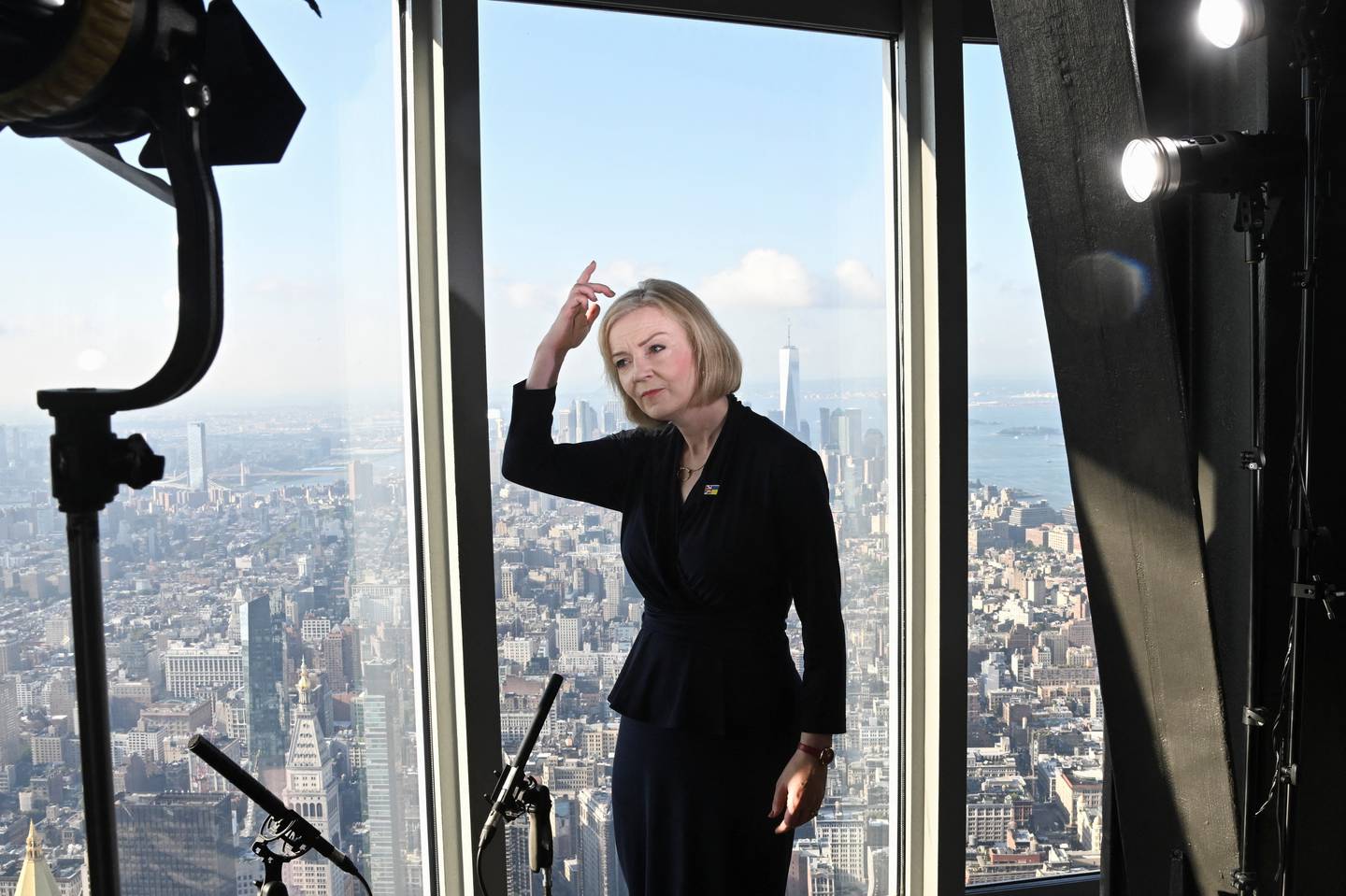 Liz Truss speaking to journalists on an upper floor of the Empire State Building in New York. PA 