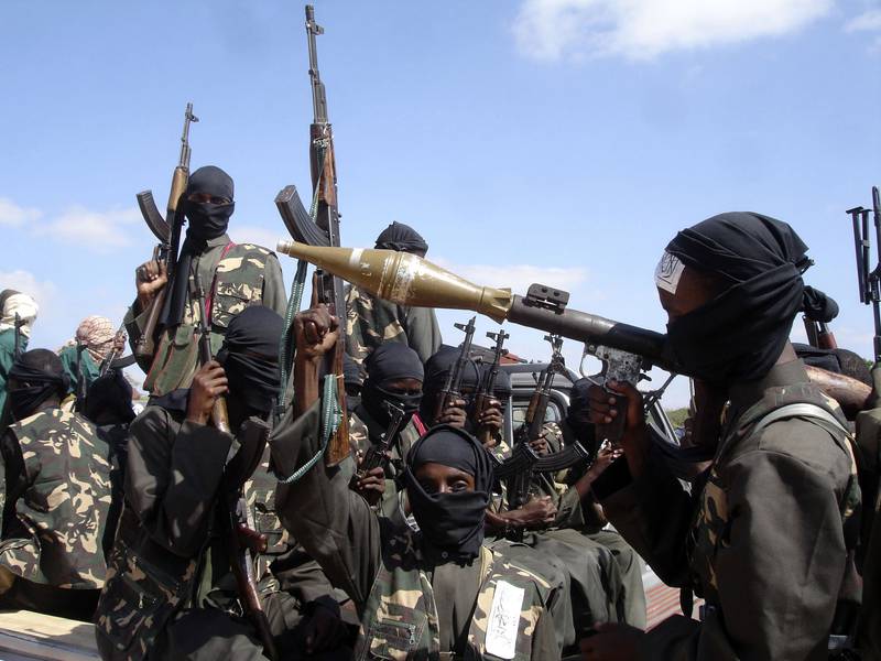 Al Shabab fighters outside Somalia's capital, Mogadishu, in 2008.  AP