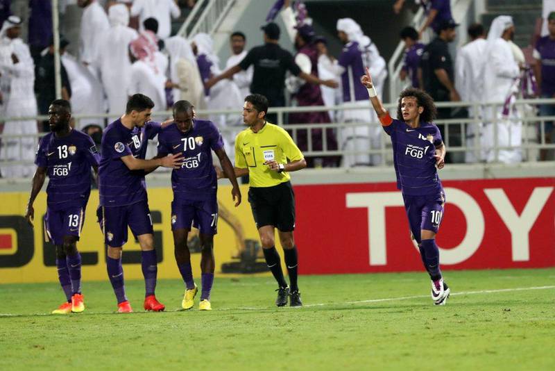 Omar Abdulrahman celebrates after scoring the opening goal. Karim Jaafar / AFP