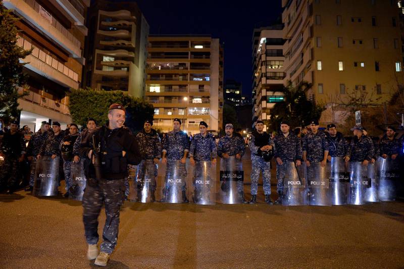 Lebanese riot police stand guard outside the residence of the Lebanese designated Prime Minister Hassan Diab in Beirut. EPA