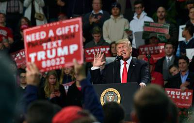 President Donald Trump speaks at a campaign-style rally at the Pensacola Bay Center, in Pensacola, Fla., Friday, Dec. 8, 2017. (AP Photo/Susan Walsh)