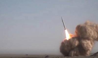 A screen grab from a video made available by Iran's Press TV shows the launch of the new Raad-500 short-range ballistic missile unveiled on the same day as the satellite launch.  EPA