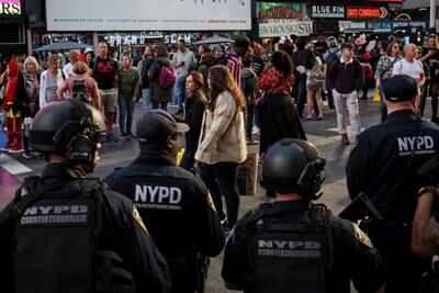 Officers in the New York City Police Department counter-terrorism unit patrol Times Square. Reuters