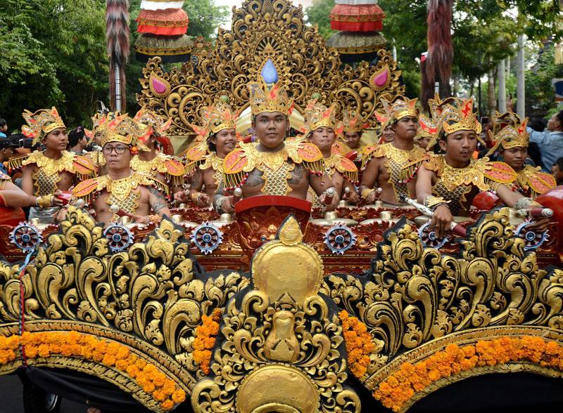 Balinese perform during a cultural parade for the XL Bali Arts Festival in Denpasar on Indonesia's resort island of Bali.  Sonny Tumbelaka / AFP