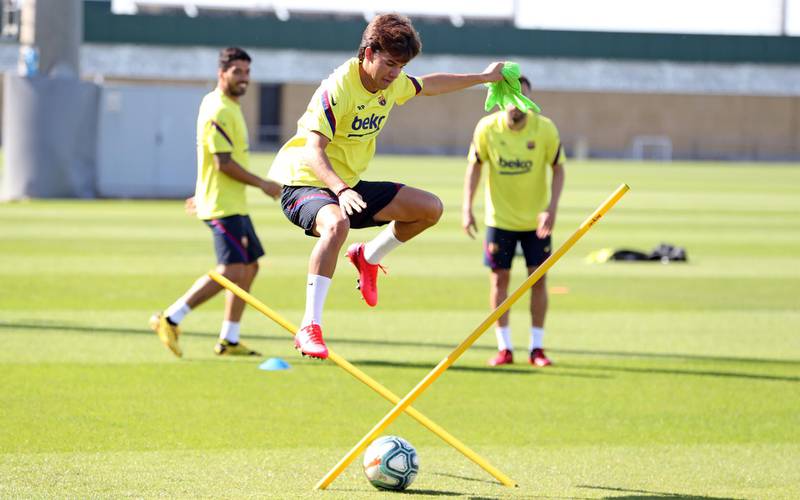 Riqui Puig jumps during a training session at Ciutat Esportiva Joan Gamper. Getty Images