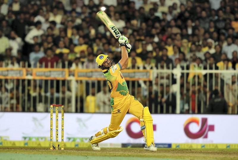 SHARJAH , UNITED ARAB EMIRATES , DEC 17  – 2017 :- Shahid Afridi of Pakhtoons team hitting a six during the 2nd semi-final against Punjabi Legends in the T10 Cricket League held at Sharjah Cricket Stadium in Sharjah.  (Pawan Singh / The National) Story by Paul Radley
