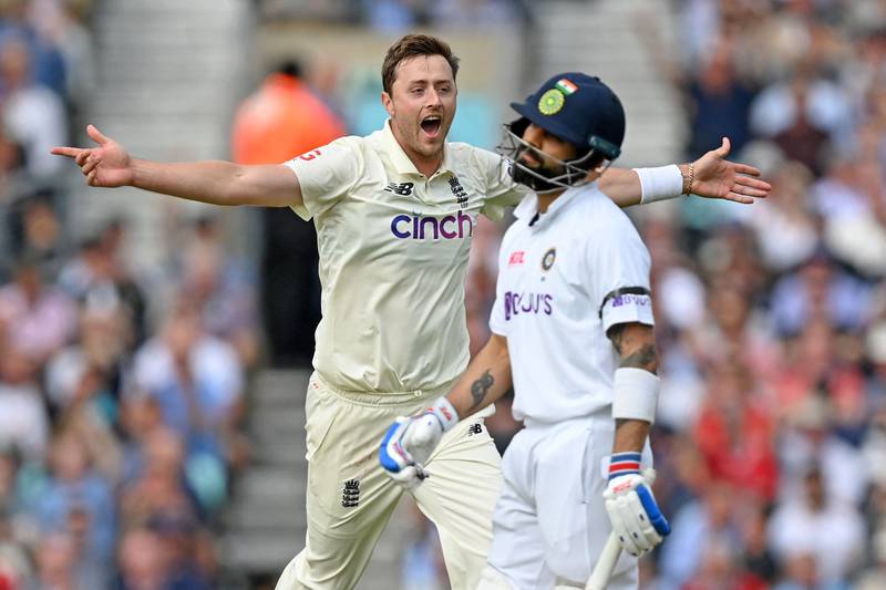 England's Ollie Robinson celebrates after taking the wicket of India captain Virat Kohli for exactly 50 during Day 1 of the fourth Test at The Oval on Thursday, September 2. AFP
