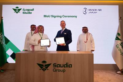 Ibrahim Koshy, chief executive of Saudia, and Tony Douglas, chief executive of Riyadh Air, during a signing ceremony at the Dubai Airshow. Photo: Saudia