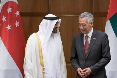 SINGAPORE, SINGAPORE - February 28, 2019: HH Sheikh Mohamed bin Zayed Al Nahyan, Crown Prince of Abu Dhabi and Deputy Supreme Commander of the UAE Armed Forces (L) and HE Lee Hsien Loong, Prime Minister of Singapore (R), stands prior to a Memorandum of Understanding ceremony, at the Parliamant of Singapore. 

( Eissa Al Hammadi for the Ministry of Presidential Affairs )
---