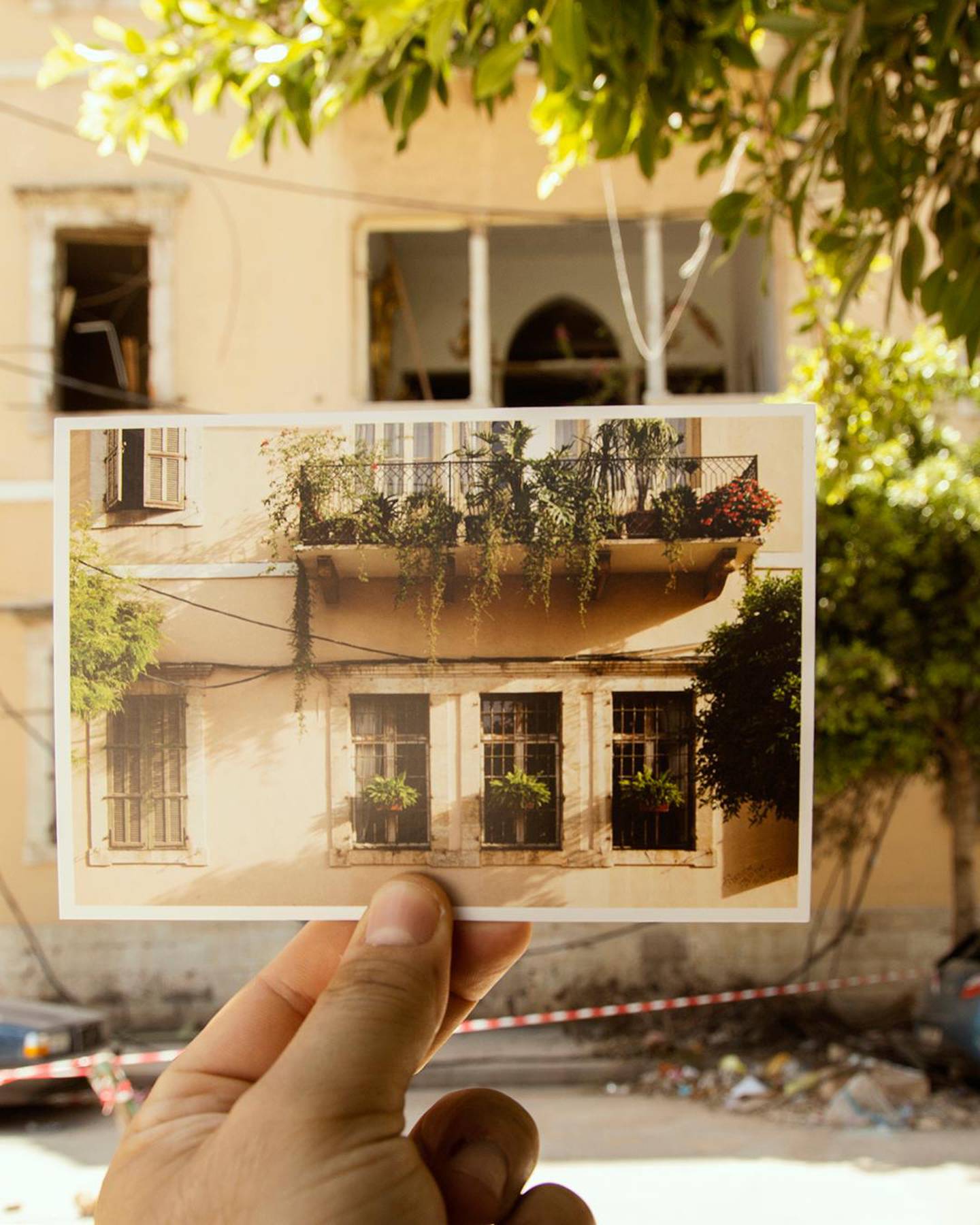 The postcards were left on the building facades. “It was a gesture of hope that we can still rebuild.” Joseph Khoury 